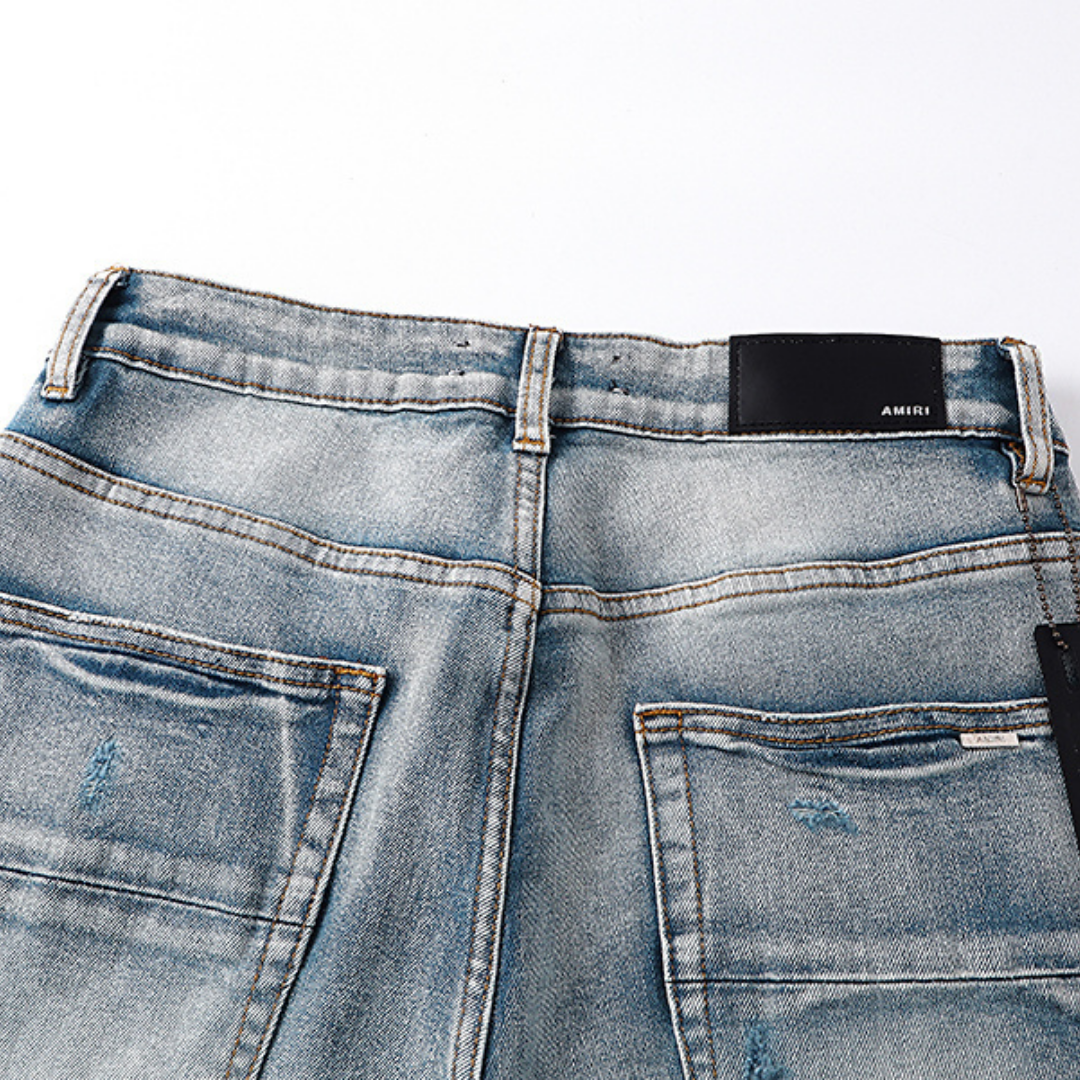 Amr Logo Staggered Jeans